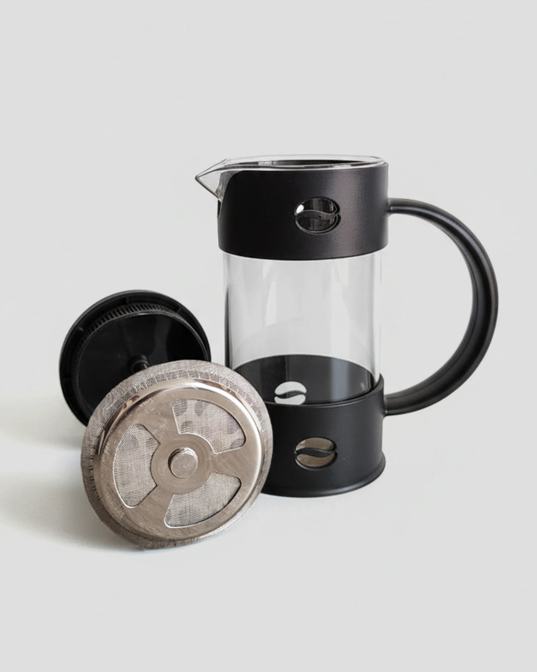 Despiece de prensa francesa negra. Émbolo con filtro de malla fina de acero inoxidable y vaso de vidrio borosilicato. Sistema de filtrado sin papel.